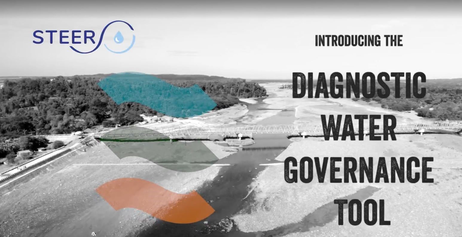 Screenshot of the video: The title reads “Introducing the Diagnostic Water Governance tool” and the “STEER” logo is visible. In the background is a black and white photo of a river bed with low water levels