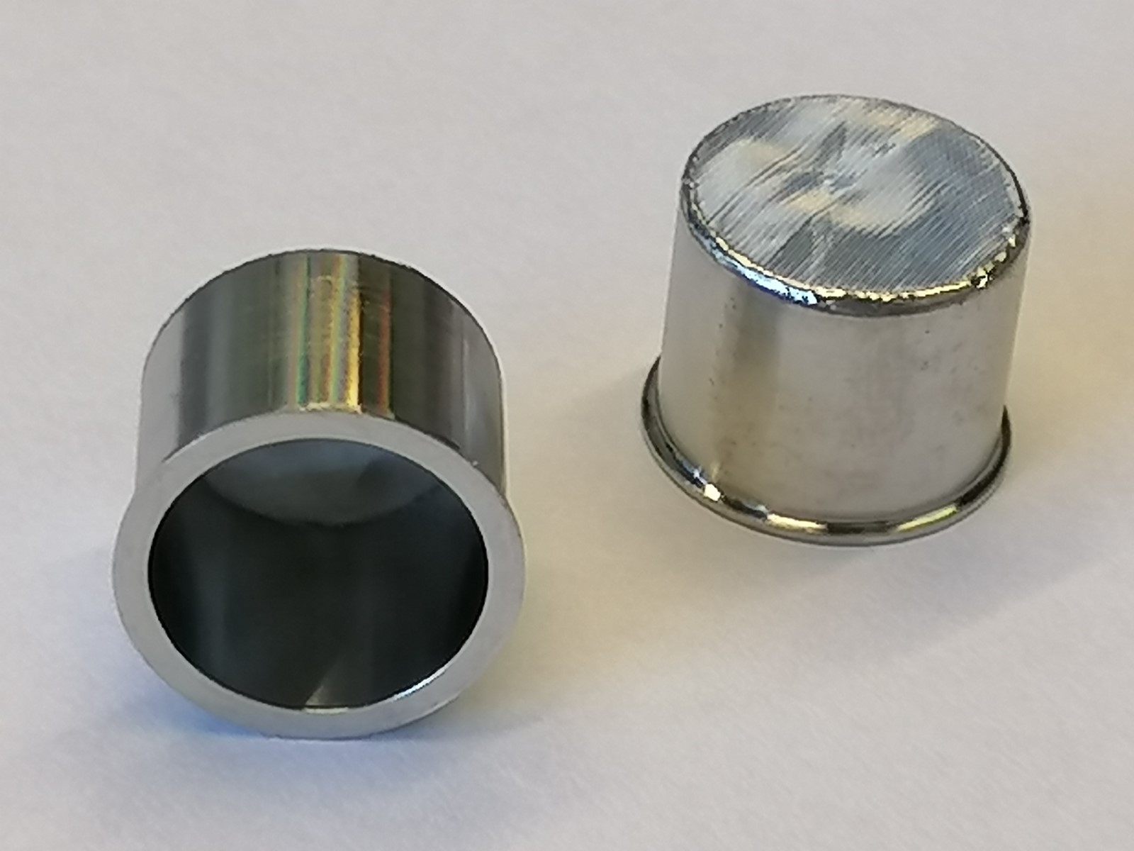 Optical photo of a stainless steel microliter filter crucible (height 10 mm, width 13 mm, pore size of the mesh 5 µm)