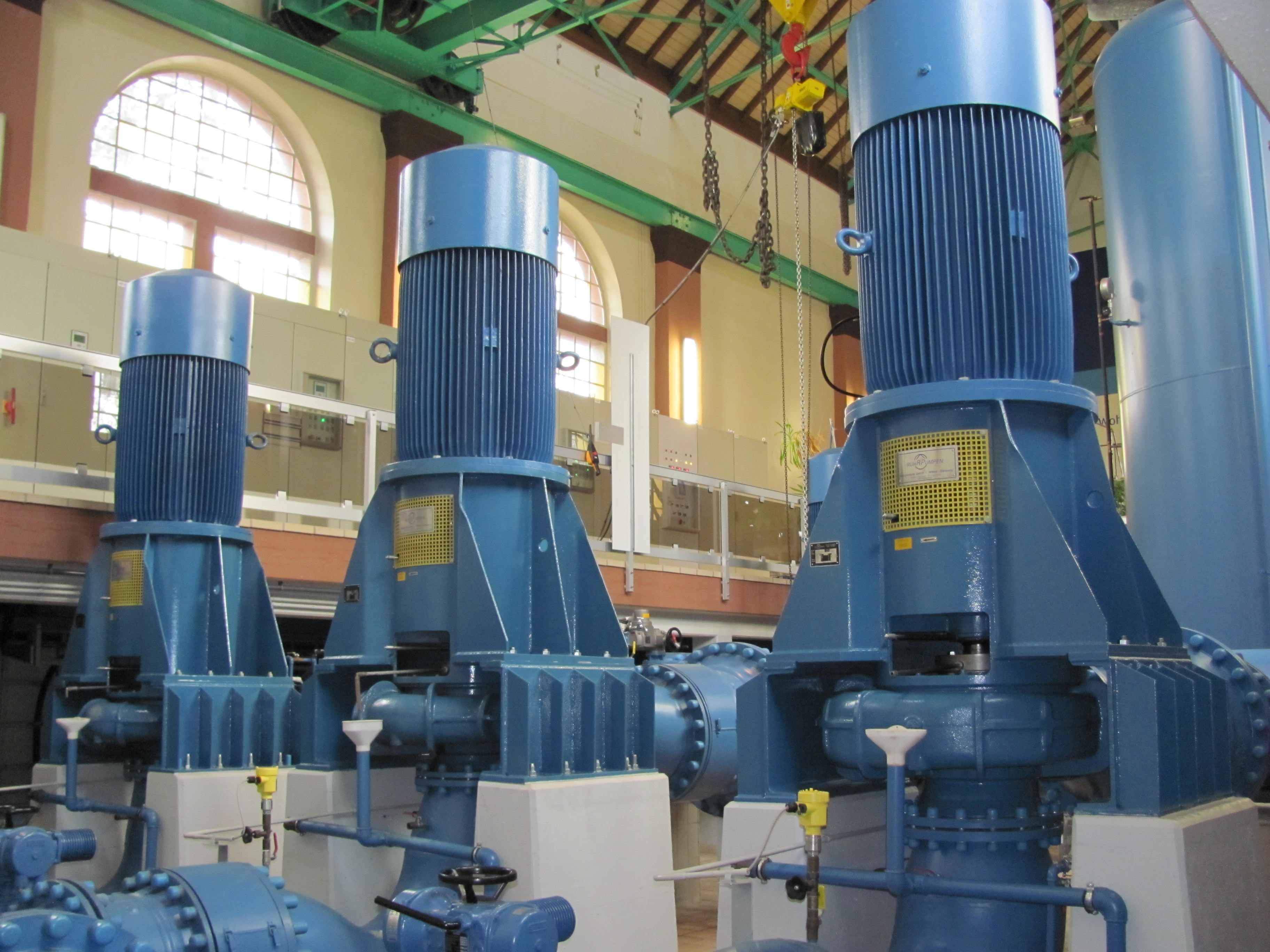 Three centrifugal pumps in a big hall of a water supply company
